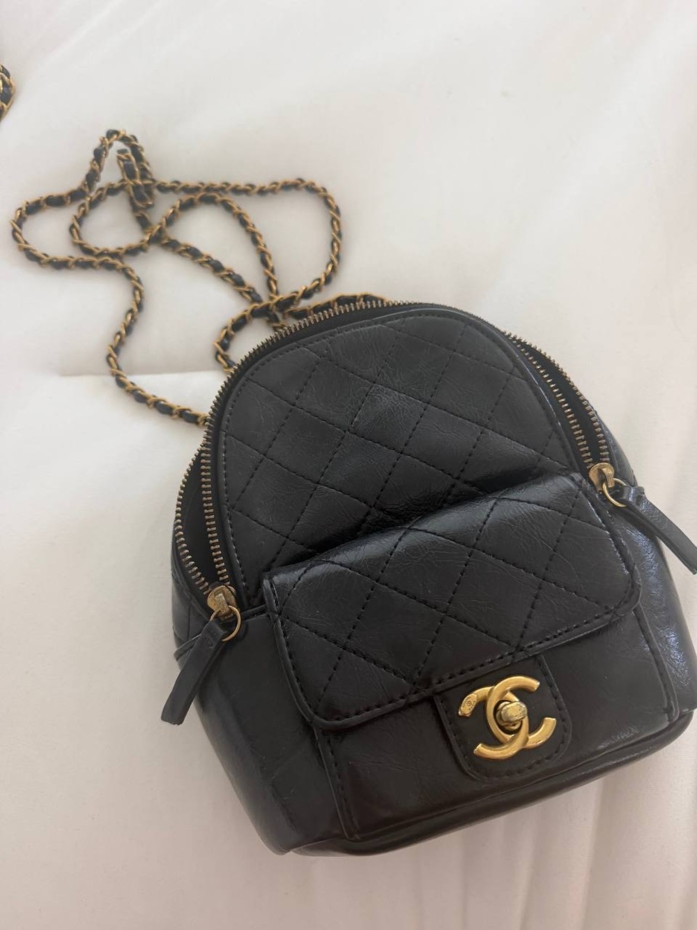 Black Quilted Mini Crossbody Backpack with Gold CC Logo